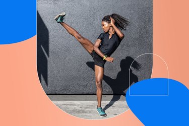 woman doing high kick as part of HIIT workout for abs