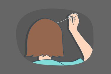 illustration of a person with brown hair plucking one gray hair, against a dark gray background